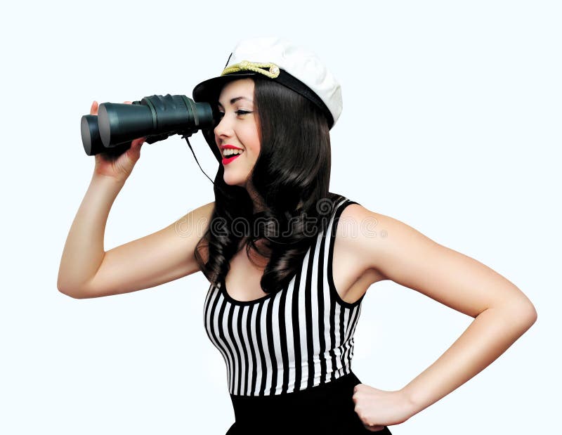 Travel, cruise, people concept - pretty smiling woman brunette sailor looking through binoculars