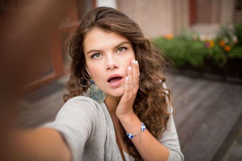 Travel girl making selfie shot, steps in the background. stock photography Travel girl making selfie shot, steps in the background. stock photography