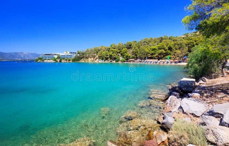 Spectacular view on one of the most beautiful beaches in Poros Island. Summer holiday stock image Spectacular view on one of the most beautiful beaches in Poros Island. Summer holiday stock image