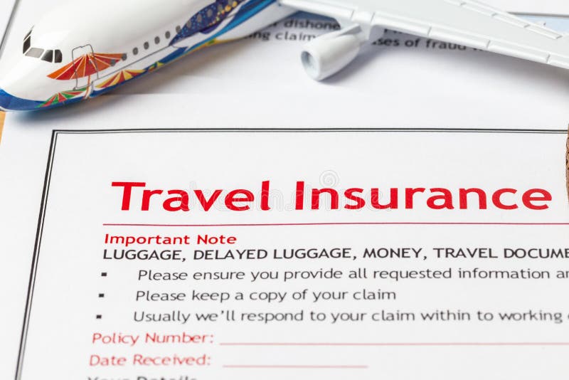 Travel Insurance Claim application form on brown envelope, business insurance and risk concept; document and plane is mock-up stock photography