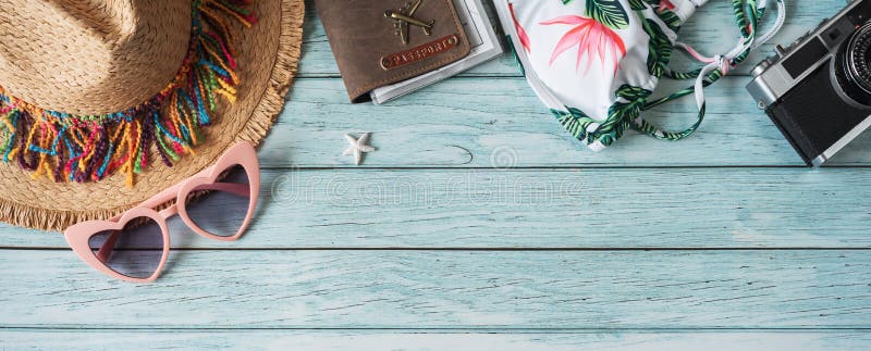 Travel summer accessories and items on wooden background with copy space, Travel planning