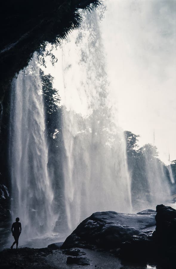 Travel to Mexico. Woman standing in waterfall Horse Tail Fall. Happy traveler enjoying nature, adventure concept. stock photo Travel to Mexico. Woman standing in waterfall Horse Tail Fall. Happy traveler enjoying nature, adventure concept. stock photo