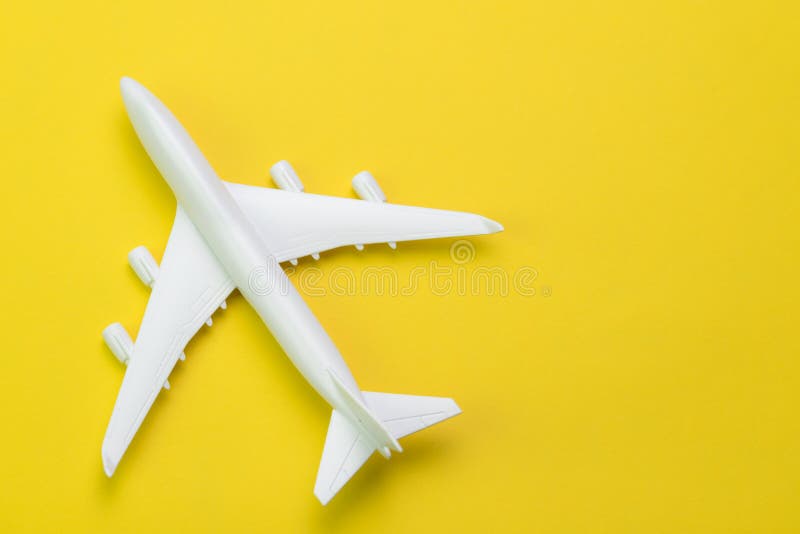 White Toy Commercial Airplane on Solid Yellow Background Using As Travel and Transportation Business Wallpaper Stock Photo - Image of happy, people: 139130616 White Toy Commercial Airplane on Solid Yellow Background Using As Travel and Transportation Business Wallpaper Stock Photo - Image of happy, people: 139130616