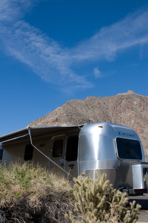 Travel trailer in desert stock image. Image of country 4607977