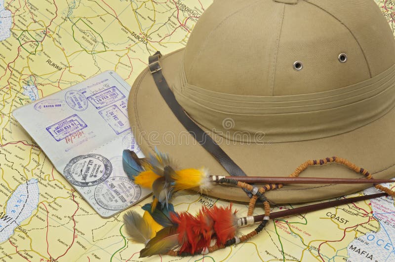 Explorer's hat and passport over map. Adventurer adventure stock images, royalty-free photos and pictures