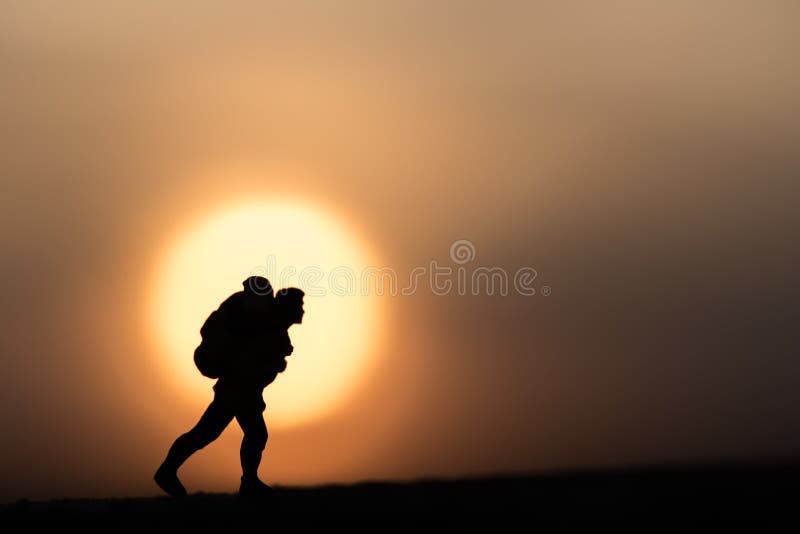 Traveler backpacker alone on a sunset background. royalty free stock photos Traveler backpacker alone on a sunset background. royalty free stock photos