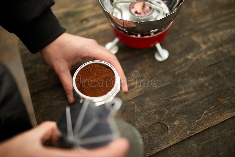 https://thumbs.dreamstime.com/b/traveler-man-making-camping-coffee-outdoor-metal-geyser-maker-gas-burner-step-travel-activity-relaxing-bushcraft-206999622.jpg