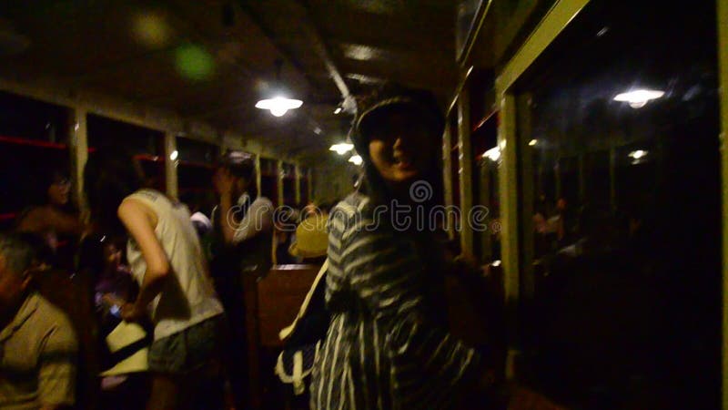 Traveler on Sagano Scenic Railway in tunnel at Arashiyama in Kyoto, Japan