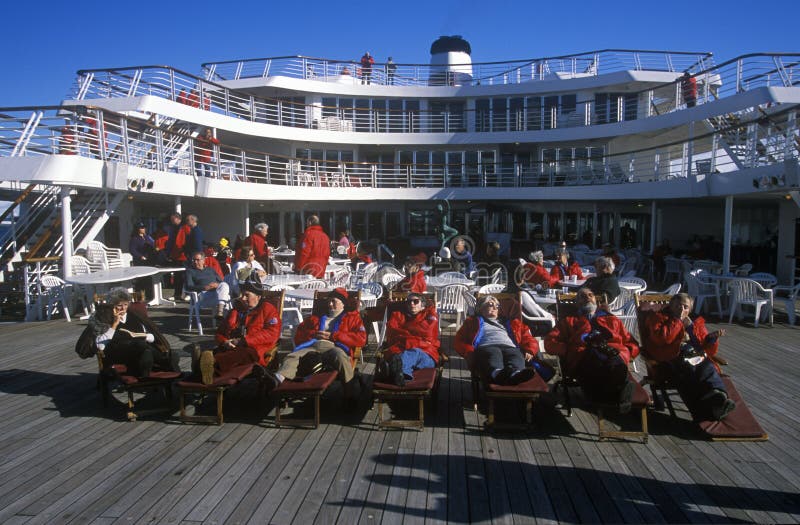 Travelers in deck chairs on deck of cruise ship Marco Polo, Antarctica