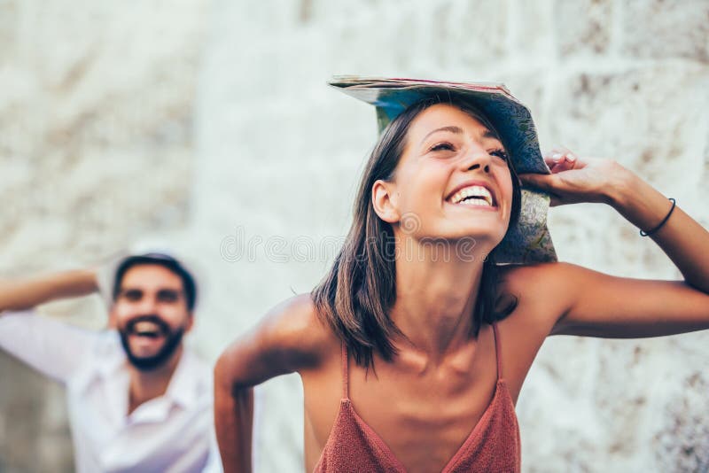 Traveling couple of tourists walking around old town. stock images Traveling couple of tourists walking around old town. stock images