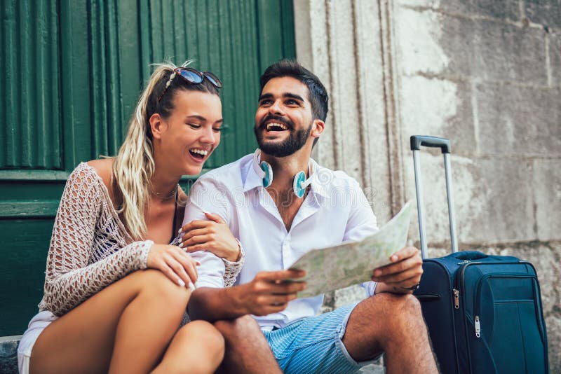Traveling couple of tourists walking around old town. stock photography Traveling couple of tourists walking around old town. stock photography