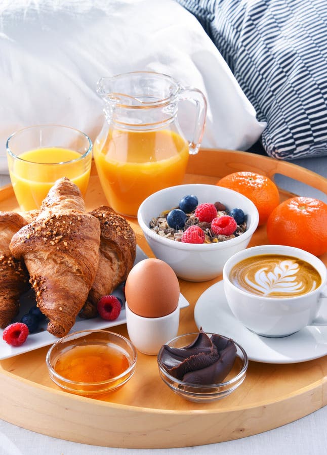 A Tray with Breakfast on a Bed in a Hotel Room Stock Photo Image of