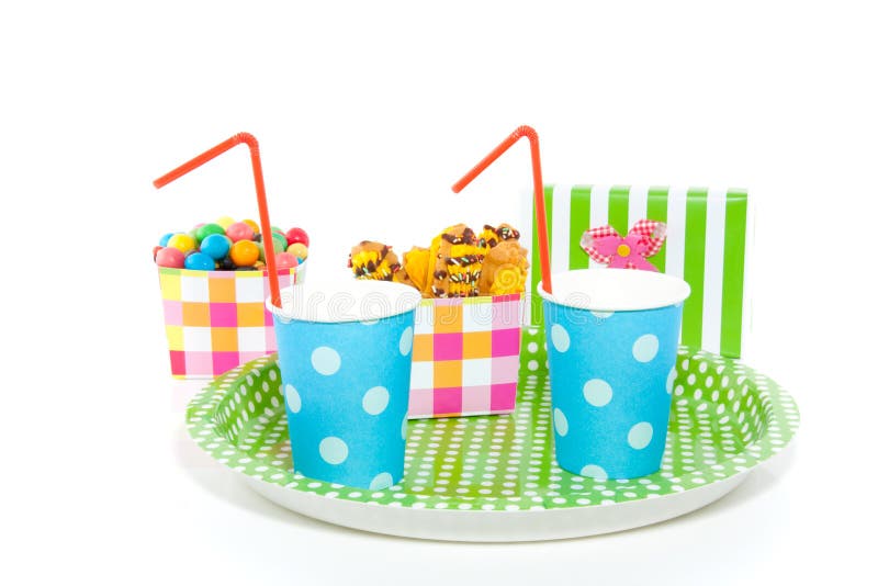 A tray with cups and candy