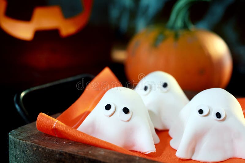 Tray of cute little Halloween monsters or ghosts