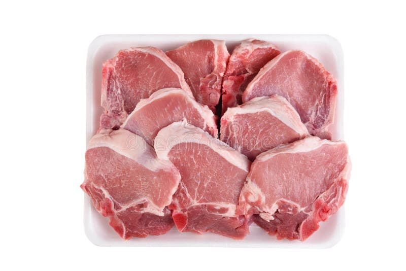 A tray full of fresh Pork Loin Chops isolated on white