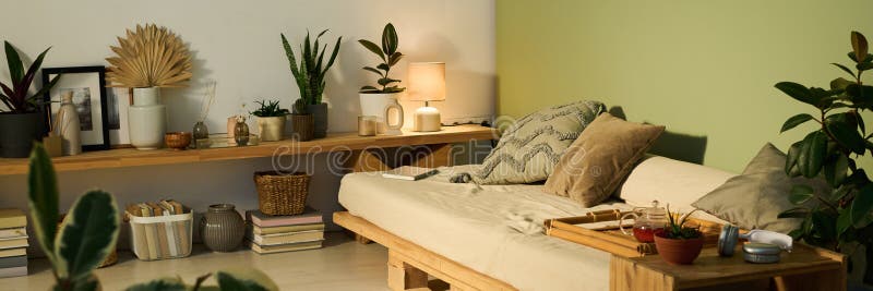 Tray with teapot standing on couch stock images