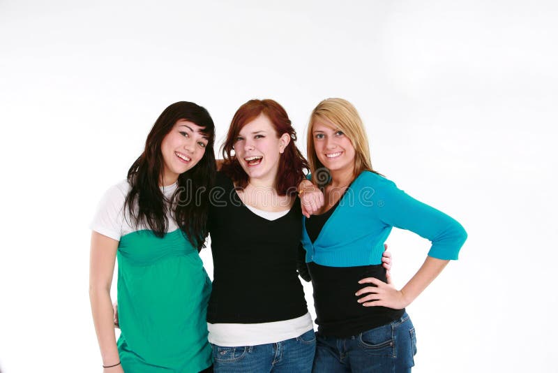 Tre ragazze teenager felici fotografia stock libera da diritti Tre ragazze teenager felici fotografia stock libera da diritti