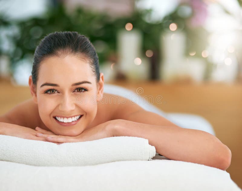 Treat Yourself To A Blissful Day At The Spa Portrait Of An Attractive Young Woman Relaxing On A