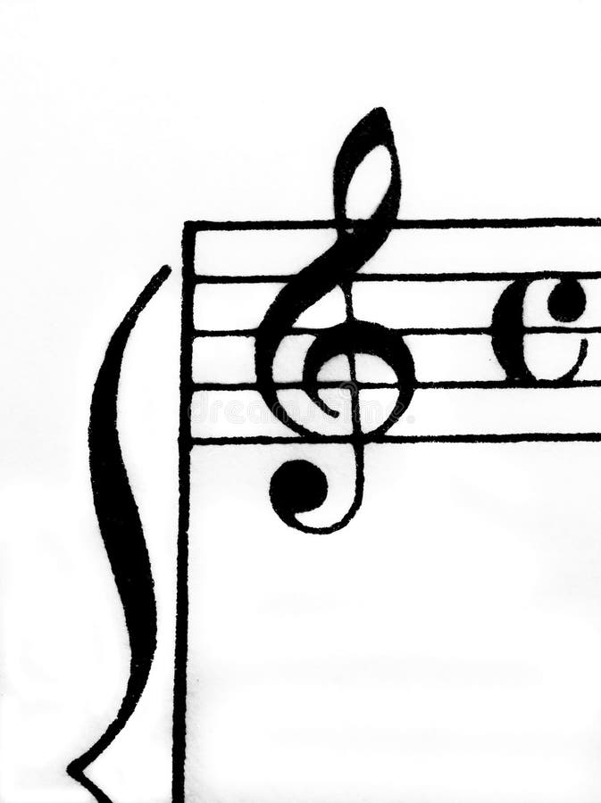 Treble clef and time signiture on white paper. Treble clef on sheet music (manuscript) with common time signiture and ledger lines royalty free stock image Treble clef and time signiture on white paper. Treble clef on sheet music (manuscript) with common time signiture and ledger lines royalty free stock image
