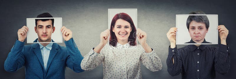 Tree people covering their faces using photo sheets with happy, sad and neutral emotions, like mask to hide real expression from royalty free stock photo Tree people covering their faces using photo sheets with happy, sad and neutral emotions, like mask to hide real expression from royalty free stock photo