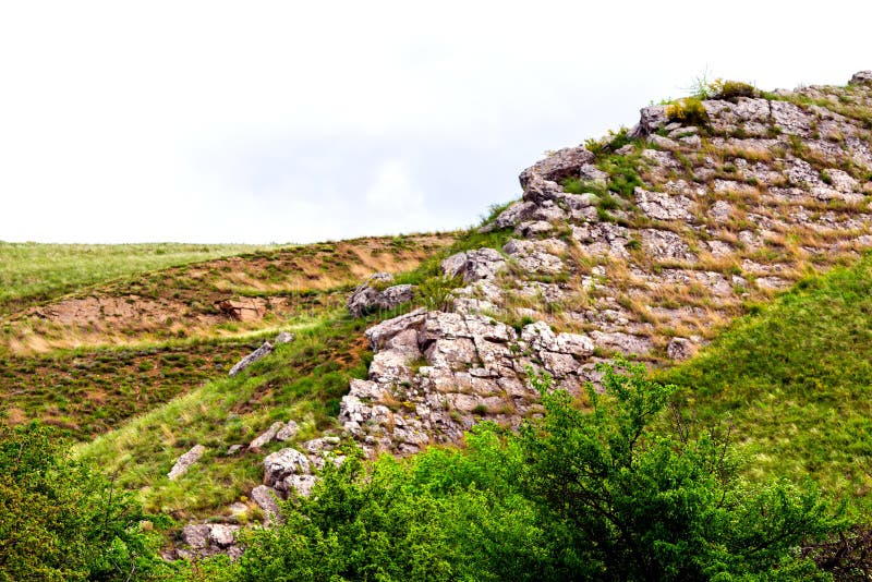 Edge Of Steep Slope On Rocky Hillside In Foggy Weather. Dramatic Scenery In  Mountains Stock Photo, Picture and Royalty Free Image. Image 81557891.