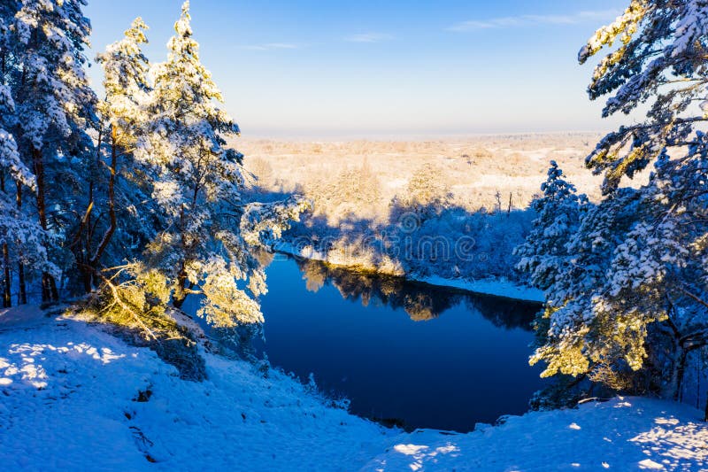 Trees reflect in river on winter day, beautiful landscape. Morning scenery. New year concept stock photography Trees reflect in river on winter day, beautiful landscape. Morning scenery. New year concept stock photography