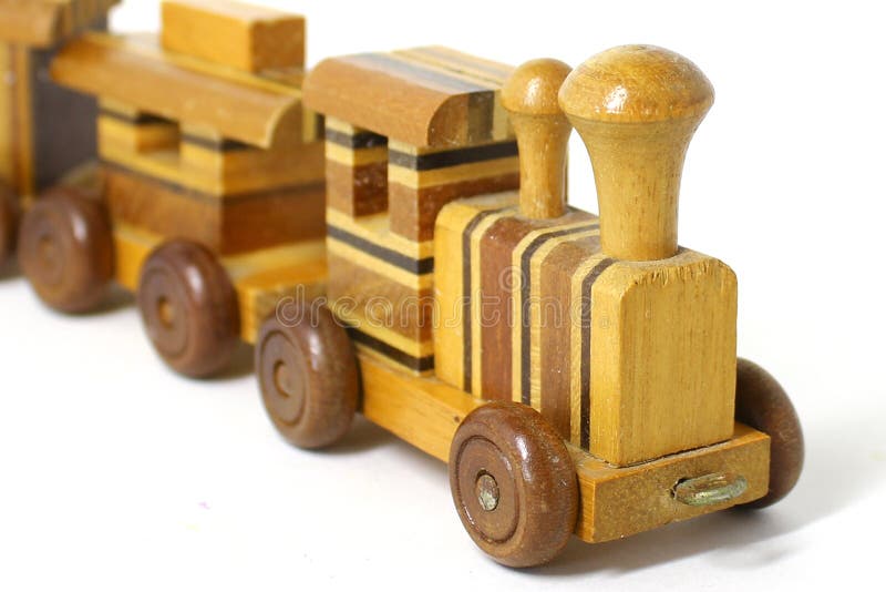 Trem De Madeira Do Brinquedo No Trilho Imagem de Stock - Imagem de bloco,  brinquedos: 5743593