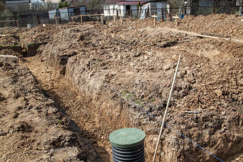 Trench Dug by Hand Under the Foundation or for Laying Drainage Stock ...