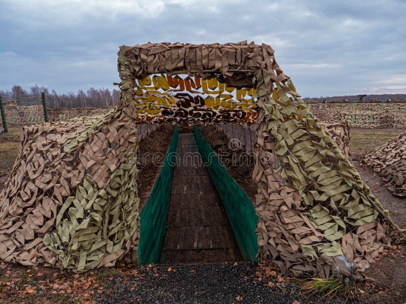A Trench on the Front Line, Covered with Camouflage Netting Stock Photo