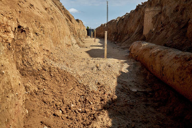 A Trench for Reconstruction of an Old Water Pipeline . Stock Image
