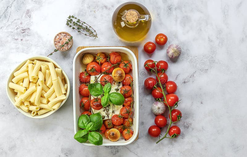 Trending viral Feta baked pasta recipe made of cherry tomatoes, feta cheese, garlic and herbs