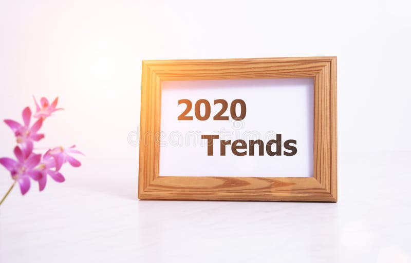 Trends 2020. Top View of Frame with Trends 2020 Lettering on Workplace