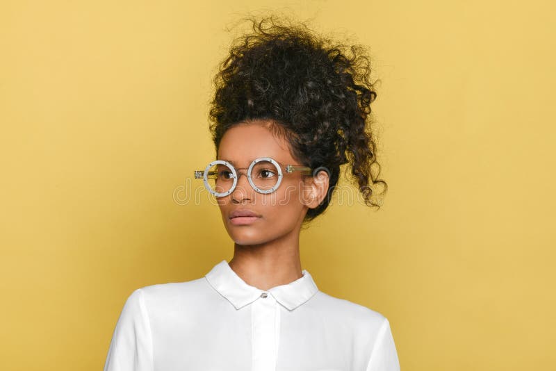 Trendy Black Girl in Stylish Retro Round Glasses with Hair Up Stock Photo -  Image of stylish, woman: 224390172