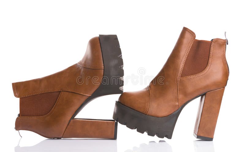 white and brown platform boots