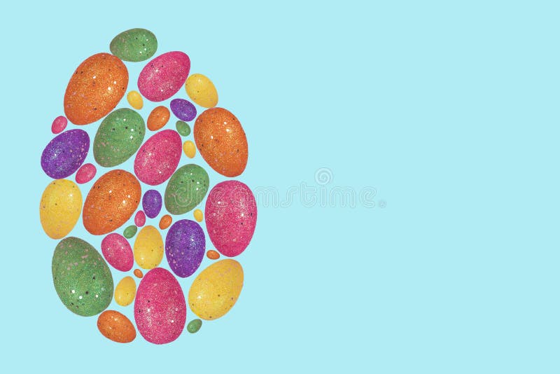 Trendy Easter layout made of flying colorful eggs on pastel pink background royalty free stock photos