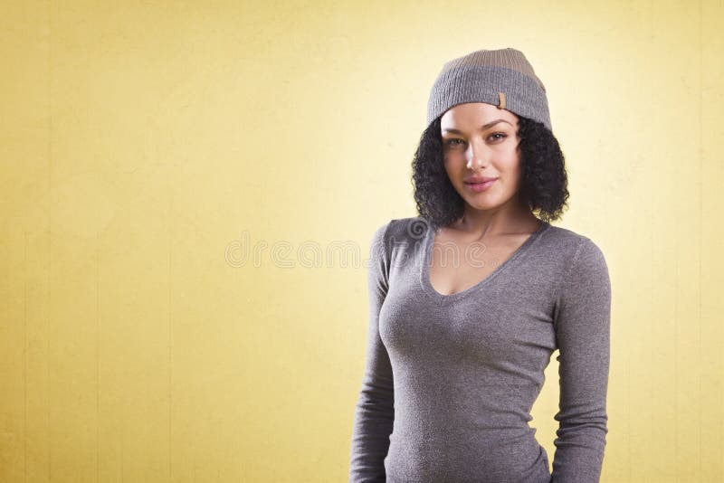 Trendy girl with look isolated on yellow background.