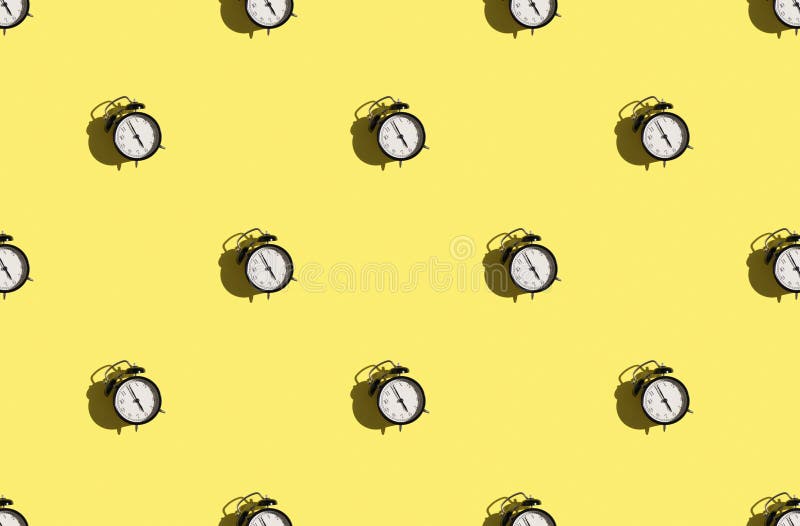 Trendy sunlight pattern made with black and white clock on light yellow background