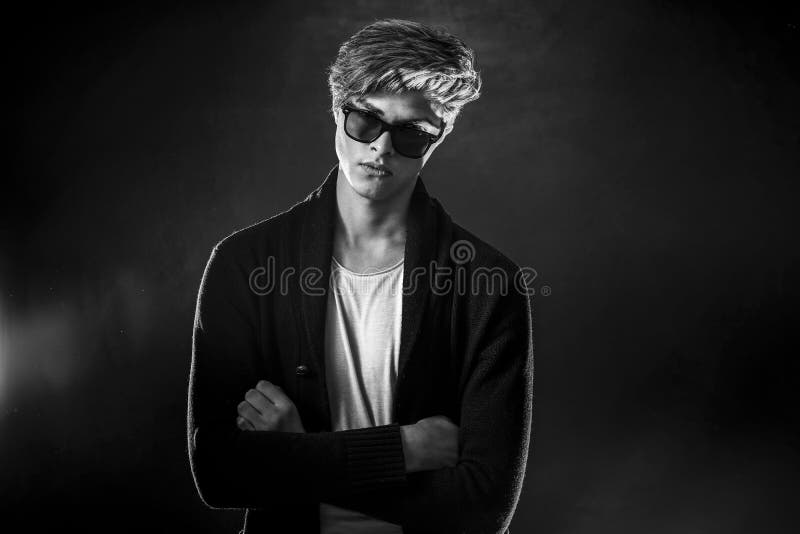 Boy Wearing Sunglasses Behind A Dark Background, Cool Profile