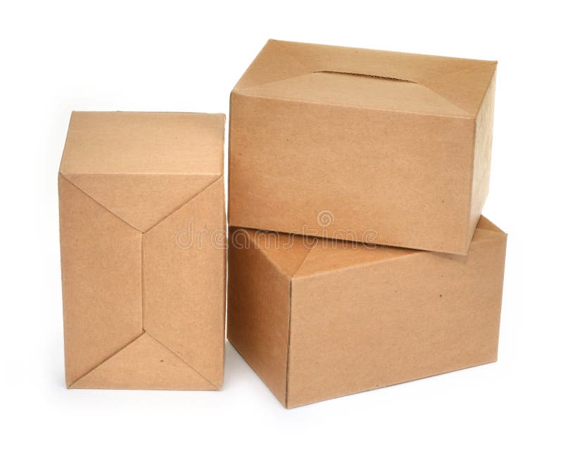 Close-up of three cardboard boxes againt white background, minimal natural shadow in front. Close-up of three cardboard boxes againt white background, minimal natural shadow in front