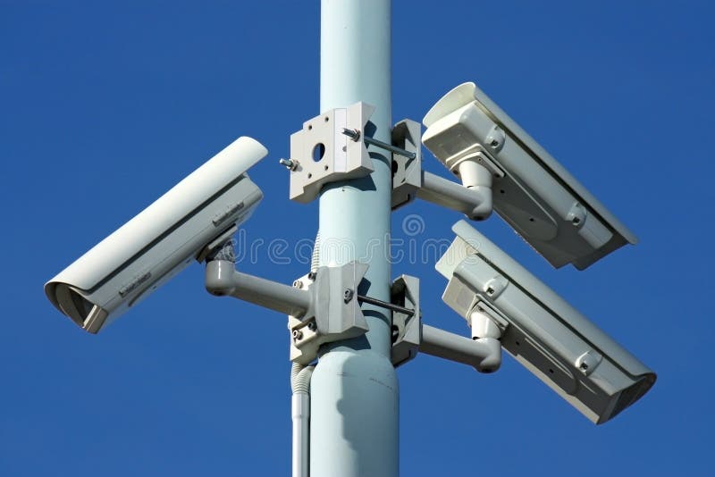 Three security cameras on blue background. Three security cameras on blue background