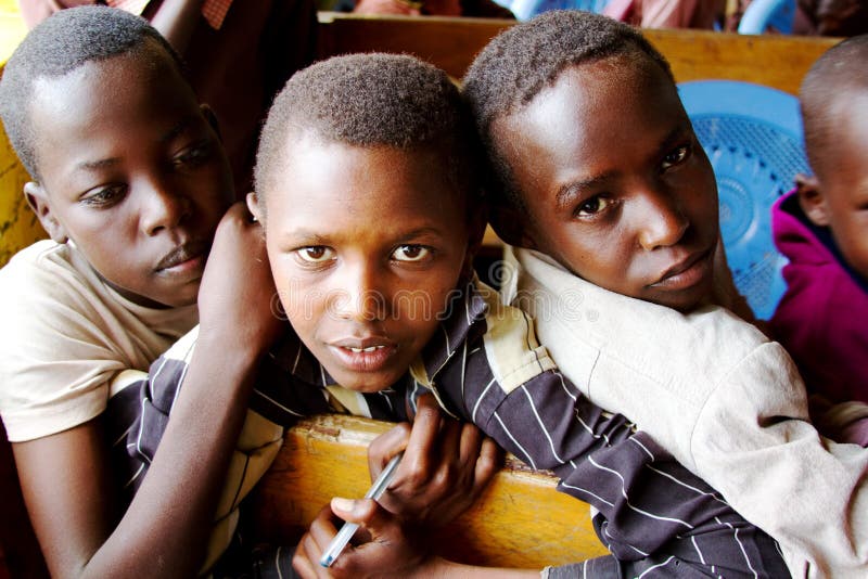 Tres escolares africanos imágenes de archivo libres de regalías Tres escolares africanos imágenes de archivo libres de regalías