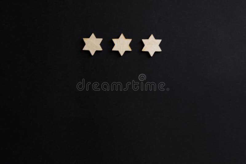 Tres Estrellas En Un Fondo Negro Estrella De David Foto de archivo - Imagen  de hombres, hombre: 137491260