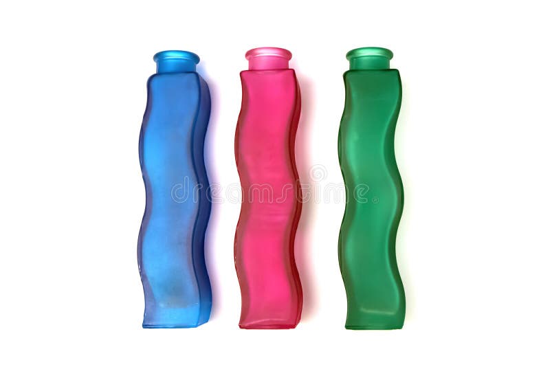 Tres floreros de cristal ondulados de diversos colores imagenes de archivo Tres floreros de cristal ondulados de diversos colores imagenes de archivo