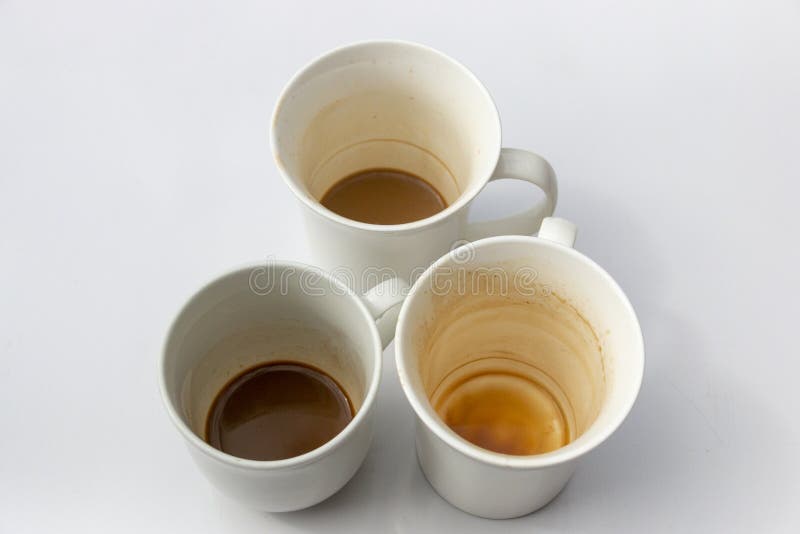 Tres tazas sucias imagen de archivo Tres tazas sucias imagen de archivo