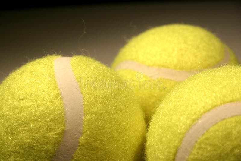 Tres tenis-bolas III fotografía de archivo Tres tenis-bolas III fotografía de archivo
