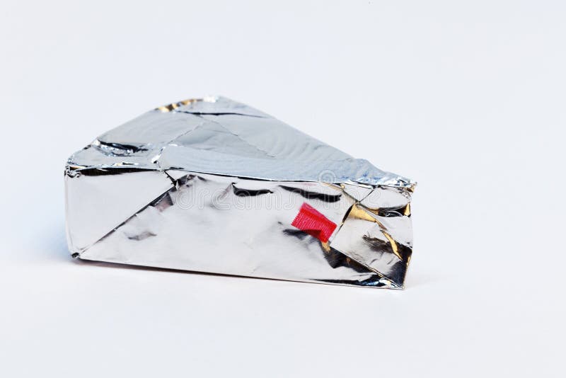 Triangular Piece of Cheese Wrapped in Silver Foil Stock Image Image