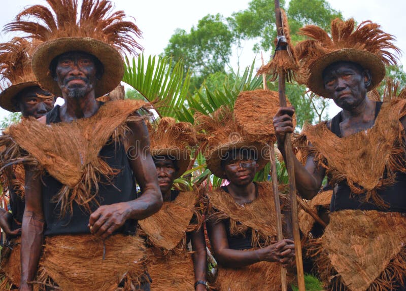 A tribe with costume participating in the ati-atihan festival. This was taken last january 17, 2009 at Kalibo, AKLAN, Panay, Central Philippines. A tribe with costume participating in the ati-atihan festival. This was taken last january 17, 2009 at Kalibo, AKLAN, Panay, Central Philippines.