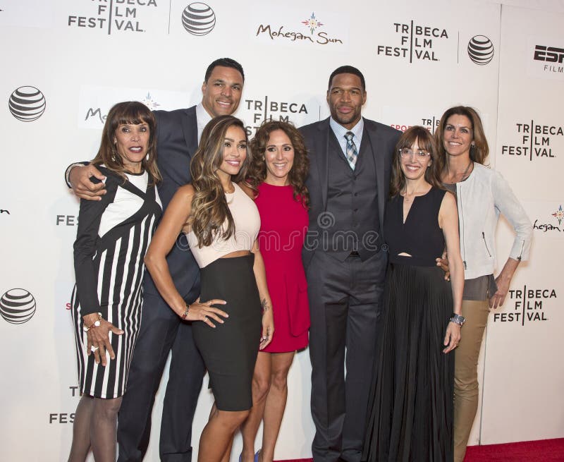 Future NFL Hall of Famer Tony Gonzalez is flanked by mother Judy Gonzalez and wife Tobie Gonzalez, a fitness maven. Also pictured are Executive Producers Constance Schwartz and Michael Strahan, as well as Director Andrea Nevins and Producer Cristan Reilly. The occasion was the world premiere of Play It Forward, at the Tribeca Film Festival in New York City on April 16, 2015. Future NFL Hall of Famer Tony Gonzalez is flanked by mother Judy Gonzalez and wife Tobie Gonzalez, a fitness maven. Also pictured are Executive Producers Constance Schwartz and Michael Strahan, as well as Director Andrea Nevins and Producer Cristan Reilly. The occasion was the world premiere of Play It Forward, at the Tribeca Film Festival in New York City on April 16, 2015.