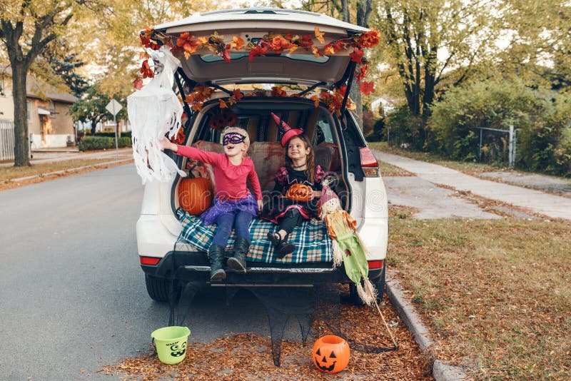 Trick or Trunk. Children Siblings Sisters Celebrating Halloween in ...