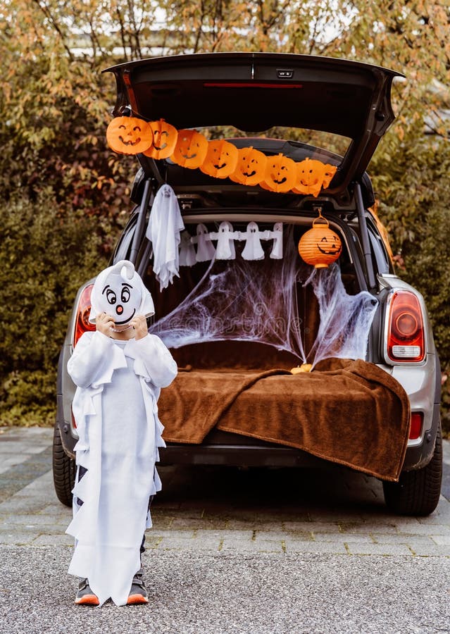 Trick or Trunk. Trunk or Treat. Little Child in Ghost Costume ...